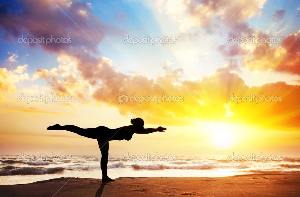 Yoga silhouette on the beach
